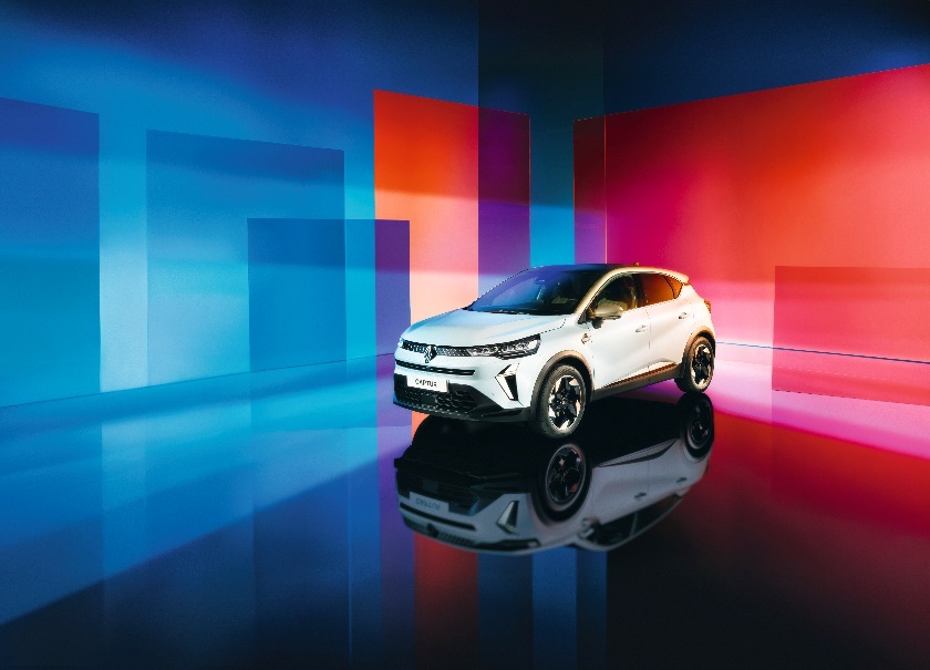 A white car in a room with colorful squares

Description automatically generated